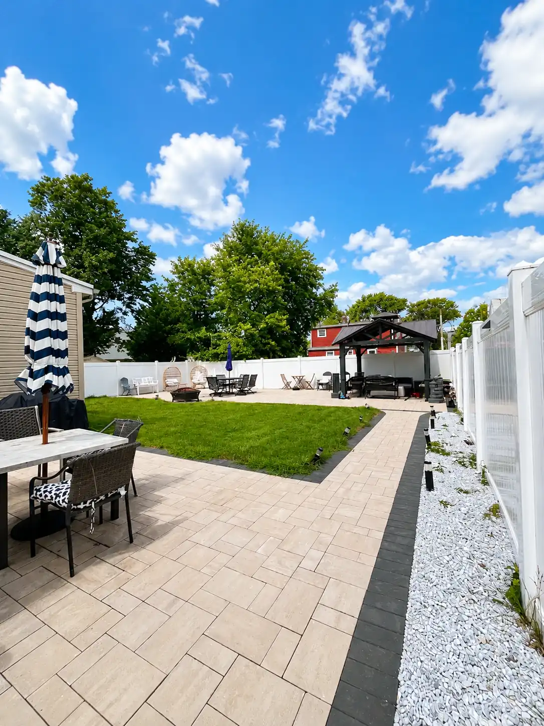 White Vinyl Privacy Fence — Backyard Patio Enclosure
